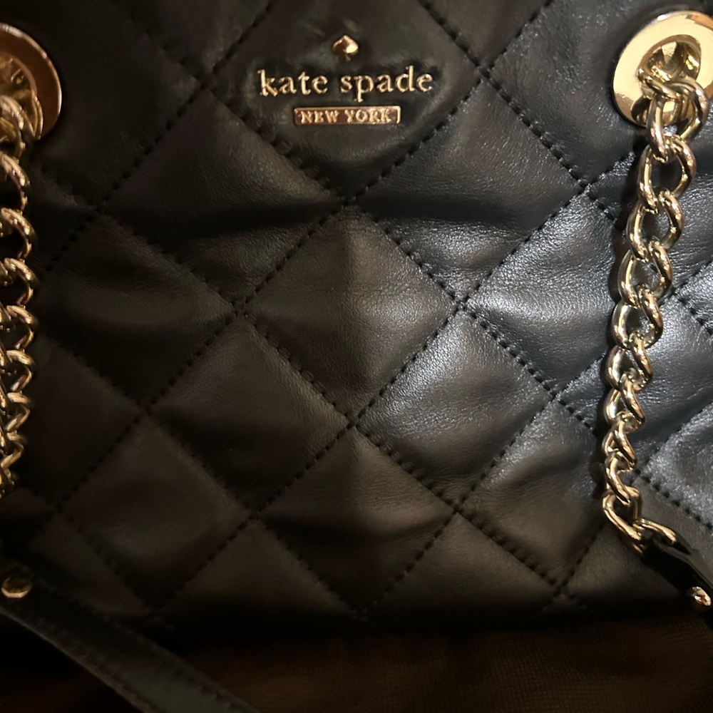 Black quilted Kate spade hand bag